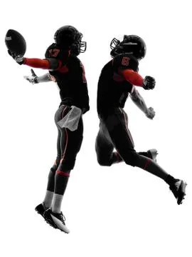 Two american football players touchdown celebration silhouette Stock Photos