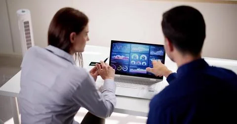 Two Analyst Using KPI Dashboard Stock Photos