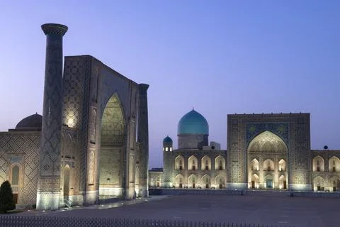 Two ancient mosques in night light. Registan square, Samarkand Stock Photos