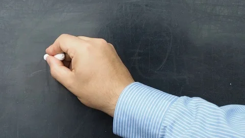 Two and two make five incorrect equation handwritten on blackboard or chalkboard Stock Footage 70914487