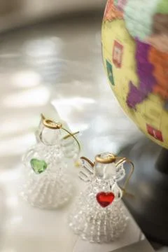 Two angels on the background of the globe. Stockfoto's