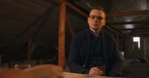 Two angry handsome elegant men talking each other for playing illegal cards game Stock Footage 117676717