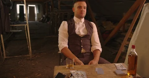 Two angry handsome elegant men talking each other for playing illegal cards game Stock Footage 117678022