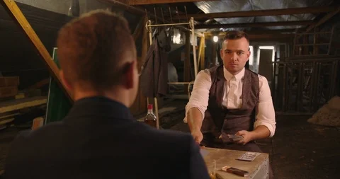 Two angry handsome elegant men talking each other for playing illegal cards game Stock Footage 117680426