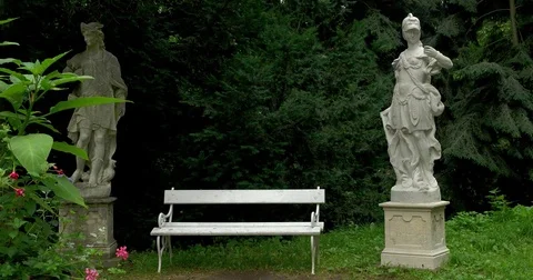 Two antique statues and bench in the Konopiště Castle garden Stock Footage 78054008