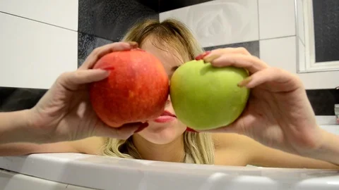 Two apple in bath Stock Footage 101552334