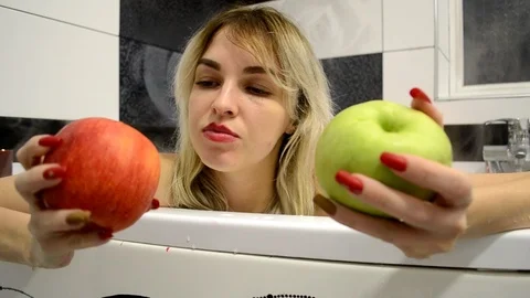 Two apple in bath Stock Footage 101554470