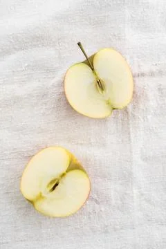 Two apple halves Stock Photos