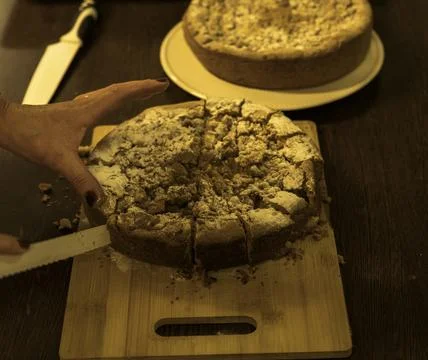 Two apple pies on the table, one of which is cut Stock Photos