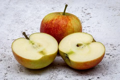 Two Apples, One Cut Open to Show the Core Stock Photos
