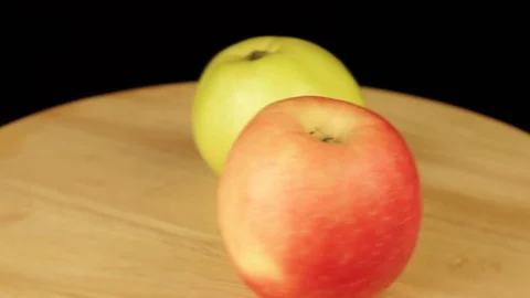 Two apples of red and green color rotate 360 degrees Stock Footage 119176565