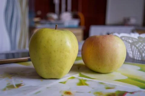 Two apples on the table Stock Photos