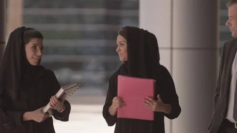 Two Arab students talking with lecturer. Stock Footage 90805888