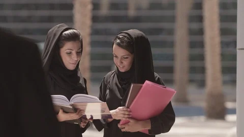 Two Arab students talking with lecturer. Video stock 90806534