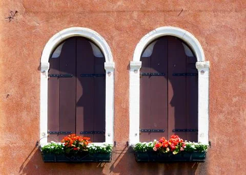 Two arch window and ancient decay orange wall Stock Photos