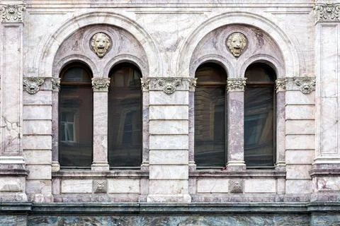 Two arched windows with columns. Stock Photos