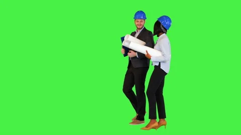 Two architects construction engineers walk discuss project building hold draft Stock Footage 157328807