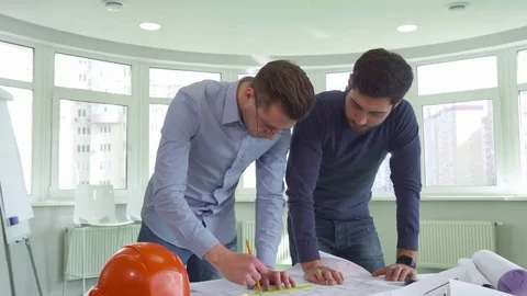 Two architects work on the project at the office Video stock 73911033