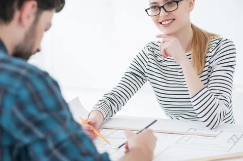 Two architects working together in office Stock Photos