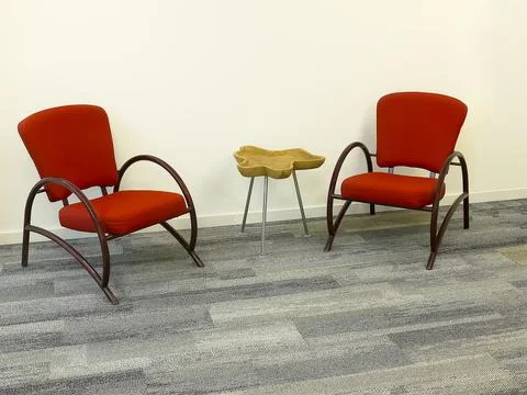 Two armchairs and a table Stock Photos