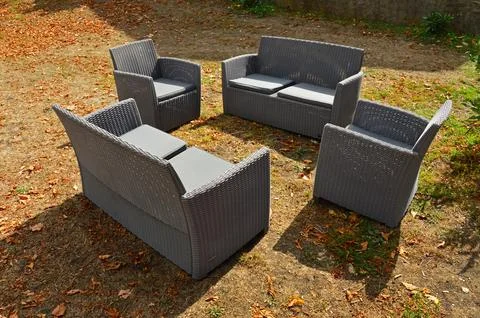 Two armchairs and two sofas Stock Photos