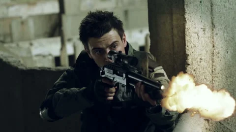 Two armed men in military uniforms were exchanging fire in the hall of an Stock Footage 67165344