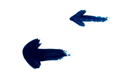 Two arrows drawn with blue nail polish isolated on a white background. Stock Photos