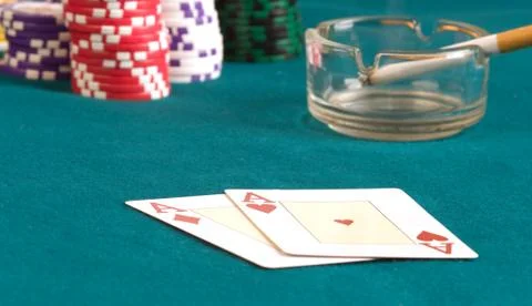 Two ases on cloth. Stock Photos