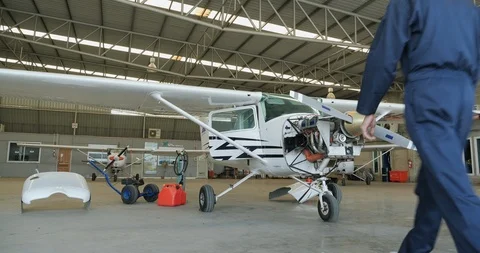 Two asian engineer having a discussion about airplane project together. Stock Footage 124776268