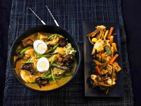Two Asian main courses Stock Photos