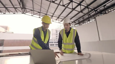 Two Asian man Civil Engineer and Contractor handshake deal working on the tab Stock Footage 199772872