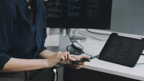 Two asian team working development of programming and encryption technology.. Stock Footage 310865524