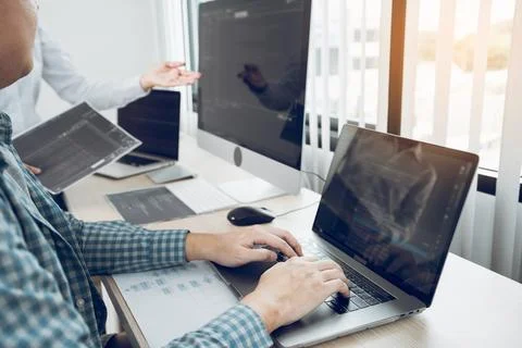 Two asian team working development of programming and encryption technology.. Stock Photos