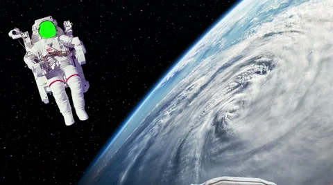Two Astronaut Spacewalk Green Screen Face by Earth with Hurricane in Space Stock Footage 59857121