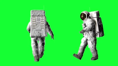 Two astronauts in full spacesuits with life support backpacks walking against 動画素材 316773534