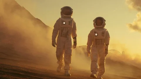 Two Astronauts in Space Suits Confidently Walking on Mars,Exploration Expedition Video stock 86802928