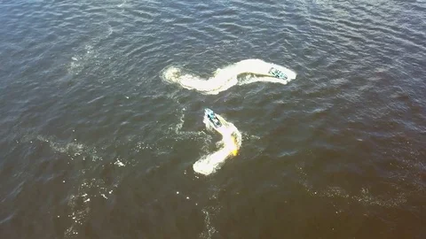 Two athletes jetski speed action at Jetski, waterskiing. Stock Footage 82471025