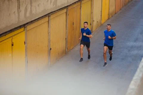 Two athletes jogging Stock Photos