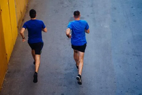 Two athletes jogging Stock Photos