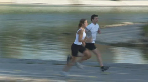 Two athletes running close Stock Footage 87447