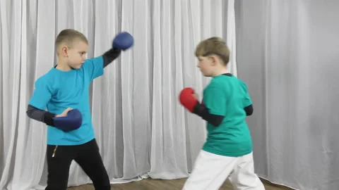 Two athletes train blocks and punches to meet each other Video stock 150125933