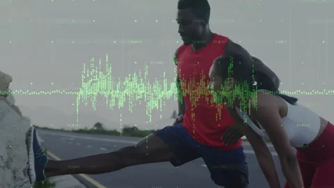 Two athletes using rock barrier performing hamstring stretches, with animated Stock Footage 316352228