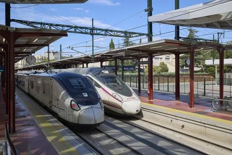 Two AVE high speed trains at Madrid railway station platforms Stock Photos