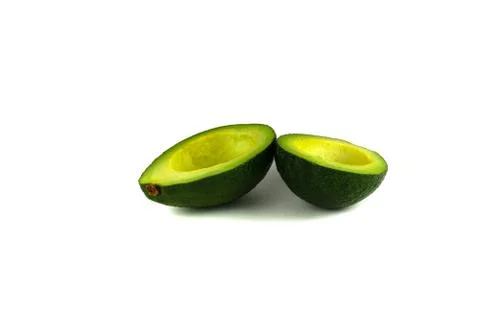 Two avocado halves Stock Photos