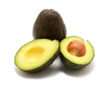 Two avocado over white background. Stock Photos