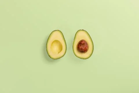Two avocado slices Stock Photos