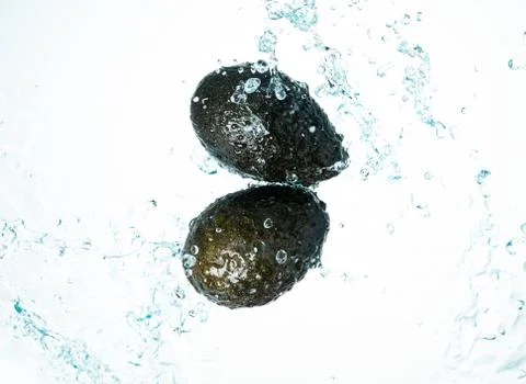Two Avocado Water Splash Stock Photos