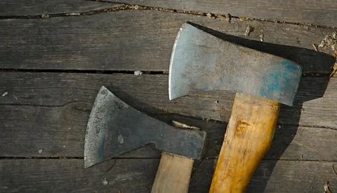 Two Axes on the ground Stock Photos