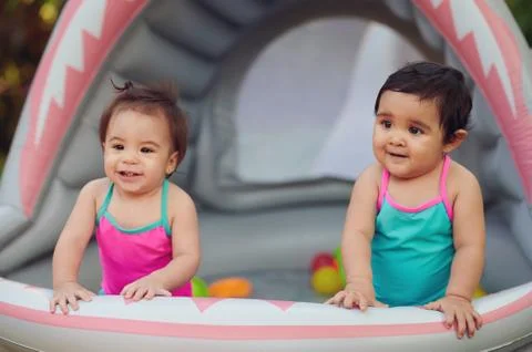Two babies spent time outside Stock Photos