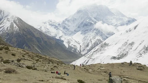Two backpackers on the trekking Larke Pass in Nepal. Manaslu area. Stock Footage 91819405
